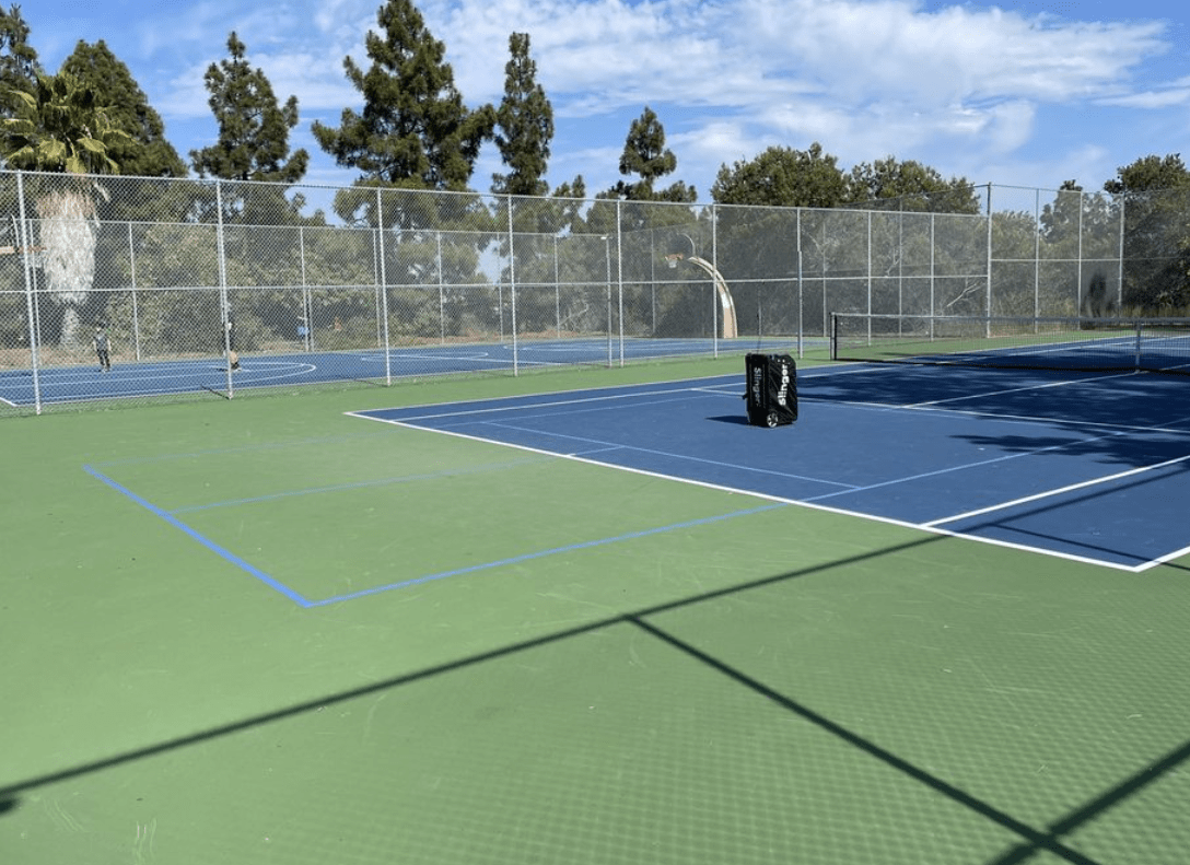 Pickleball court set up on tennis court
